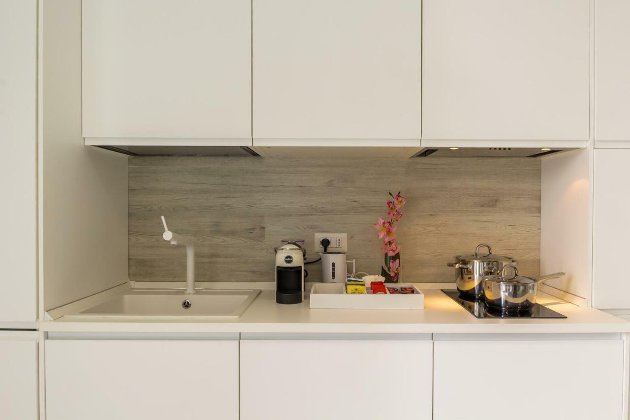 Les Suites - Apartments Рипосто Экстерьер фото